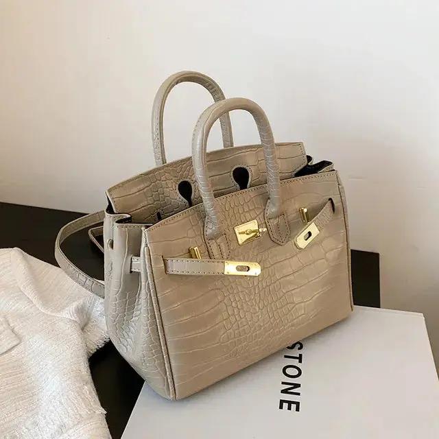 Spacious Women's Handbag with Multiple Compartments and Adjustable Strap