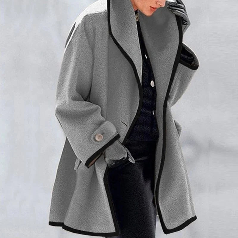 Women's Oversized Winter Coat with Wide Lapels and Button Fastening