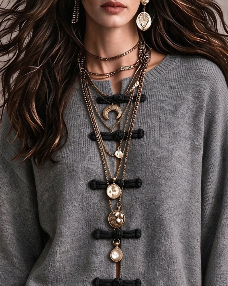 Loose-Fit Pullover with Round Neck and Frog Button Detail
