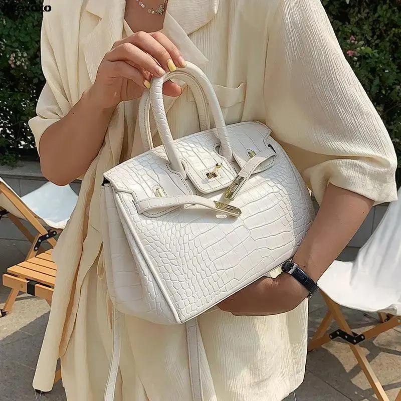 Spacious Women's Handbag with Multiple Compartments and Adjustable Strap